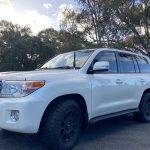 Side profile of an accessory fitment ready 200 Series LandCruiser touring build featuring Safari snorkel, ARB Base Rack and antenna, by MBC 4X4 Solutions in Central Victoria