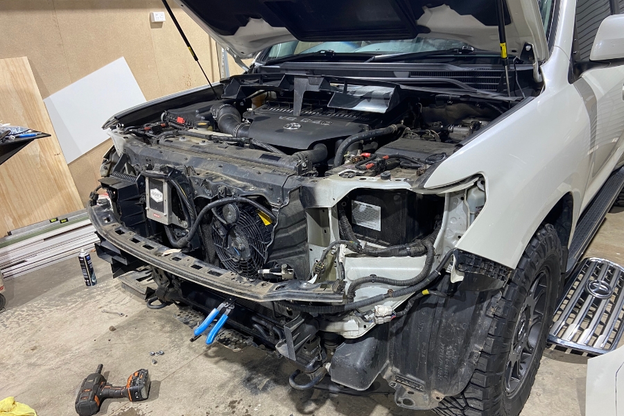 Toyota 200 Series LandCruiser with the factory front bumper removed in the MBC workshop, Bendigo, prepared for ARB Deluxe Big Tube bull bar fitment