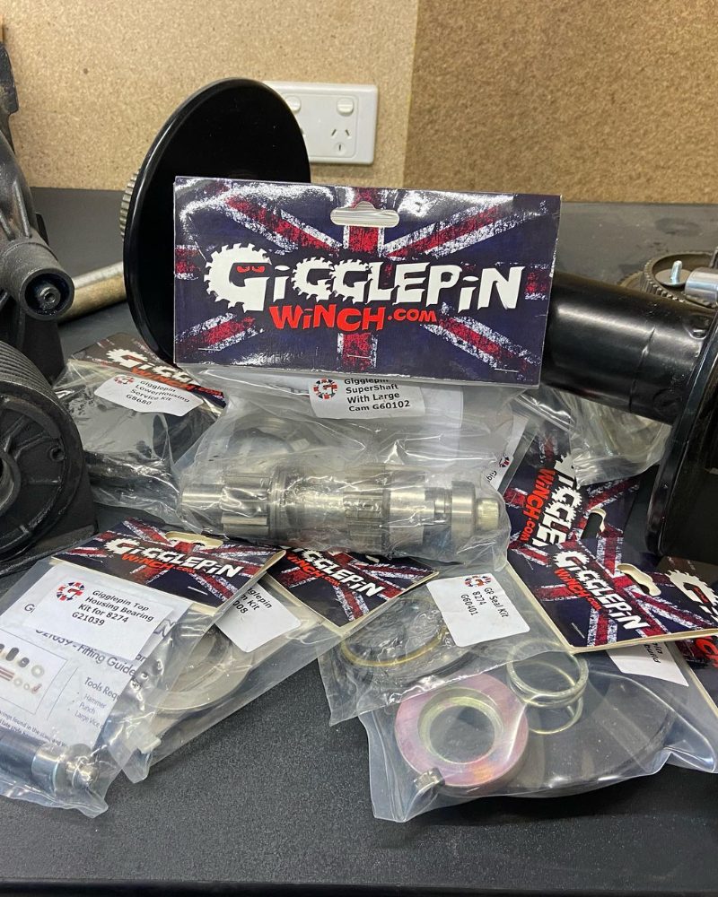 Genuine Gigglepin winch parts in their packaging on the MBC 4X4 Solutions workshop bench in Bendigo, ready for fitment to a customer's winch as an Official Gigglepin Agent in Australia