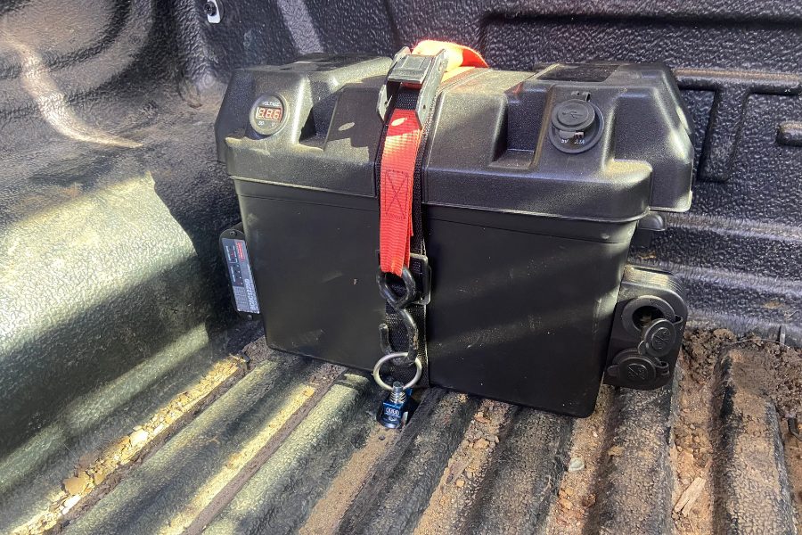 Auxiliary battery in a marine-style box mounted in a ute tub with USB, fridge and accessory sockets and a battery monitor, charged by a Red Arc BCDC1225D, fitted by MBC 4X4 Solutions in Strathdale