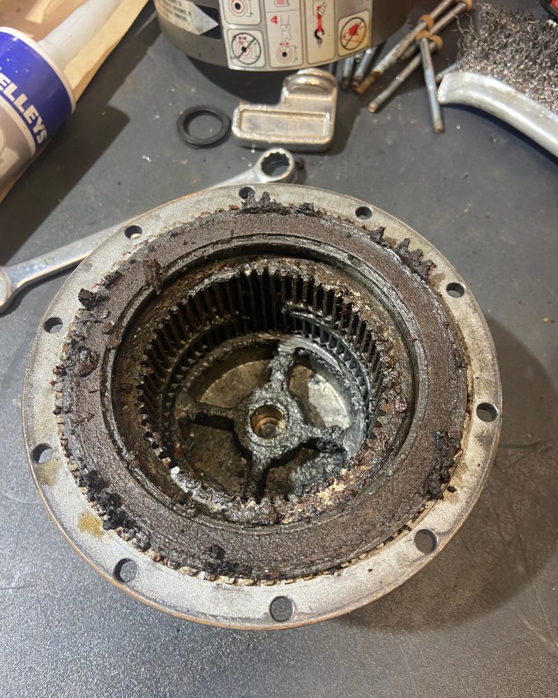 Warn low-mount winch gearbox housing removed during a winch service by MBC 4X4 Solutions near Epsom, showing water ingression, internal rust and a lack of grease